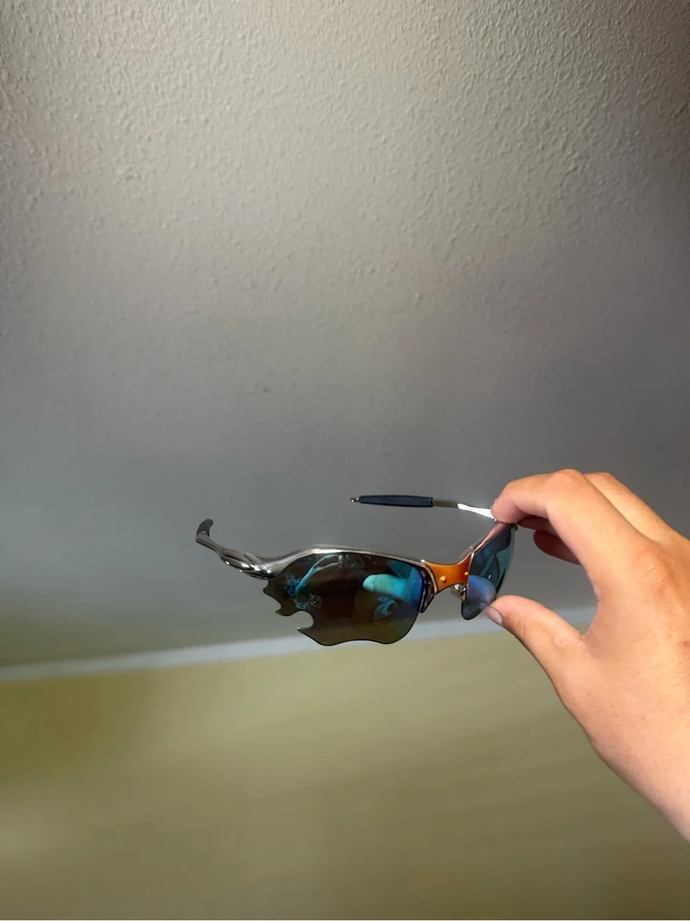 Men's Sport Sunglasses with Blue Mirrored Lenses and Orange Bridge Oakleys